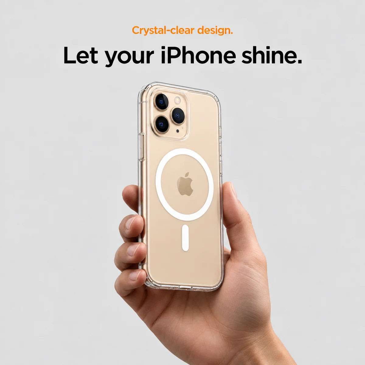 Clear magnetic phone case held at an angle, showing its transparent back and camera openings. #iPhone Model_iPhone 11 Pro