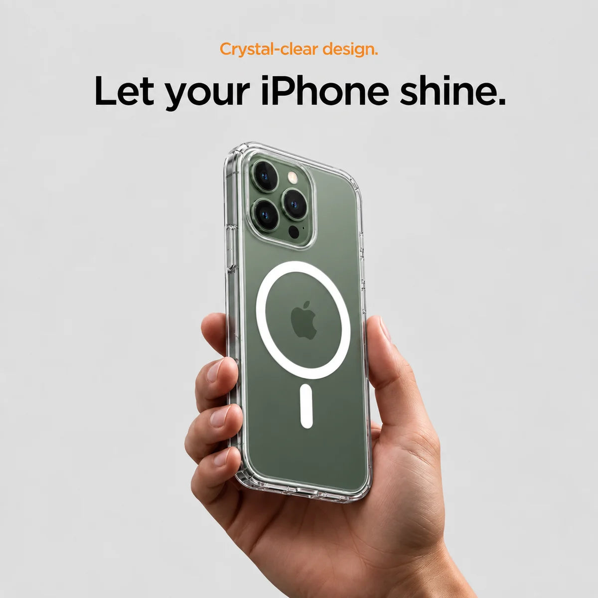 Clear magnetic phone case held at an angle, showing its transparent back and camera openings. #iPhone Model_iPhone 13 Pro