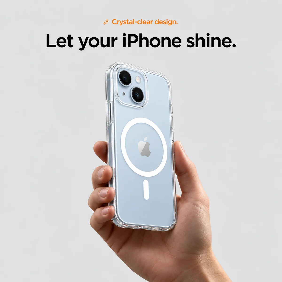 Clear magnetic phone case held at an angle, showing its transparent back and camera openings. #iPhone Model_iPhone 14