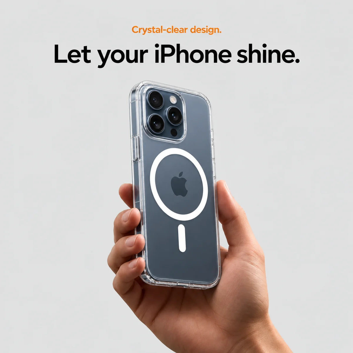 Clear magnetic phone case held at an angle, showing its transparent back and camera openings. #iPhone Model_iPhone 15 Pro