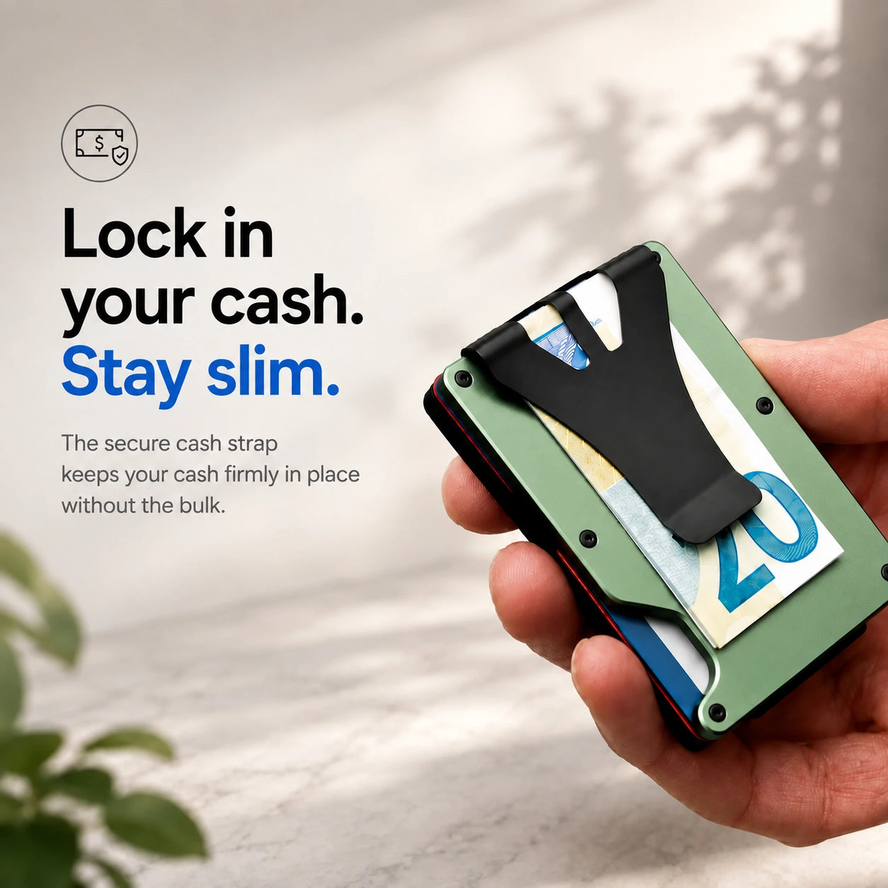 Arctic Green slim tracking card wallet holding cash under the clip #color_Arctic Green