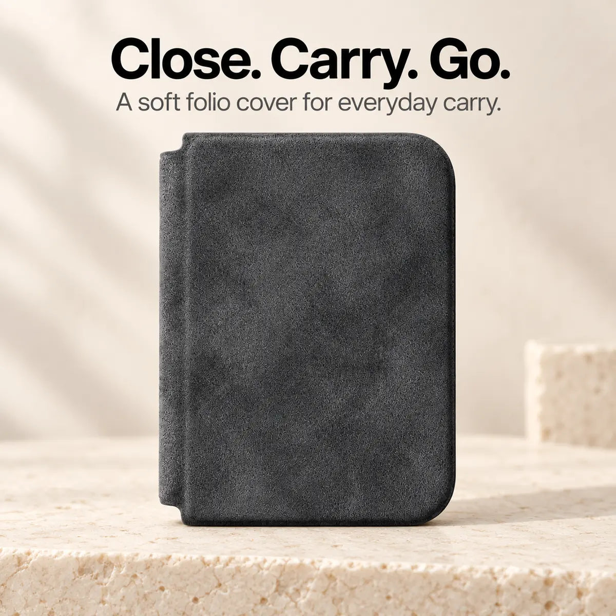 Charcoal Gray Alcantara folio case for iPhone Duo, closed front cover with a soft fabric finish #color_Charcoal Gray
