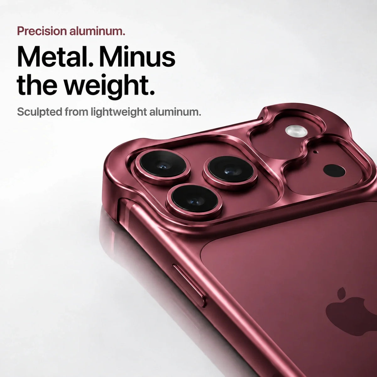 Burgundy sculpted metal phone case showing the camera guard in close-up #color_Burgundy