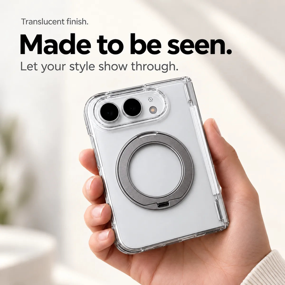 Clear translucent rear case held in a hand with the ring folded closed. #color_Pure Crystal