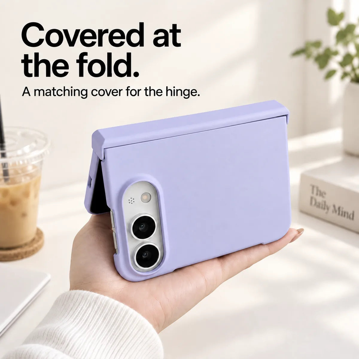 Light Purple iPhone Ultra case held partly folded, showing the matching cover along the hinge. #color_Lilac Mist