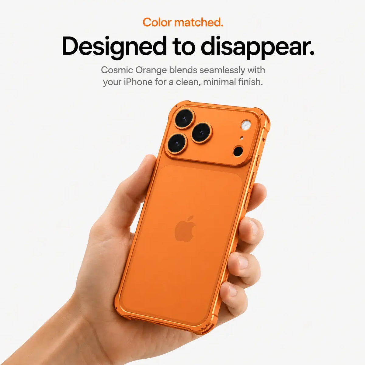 Orange aluminum bumper phone case held in one hand #color_Cosmic Orange