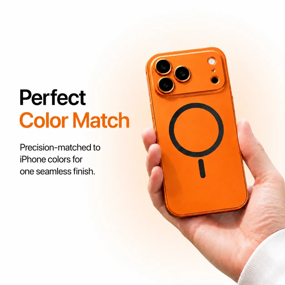 Orange metal magnetic phone case held in one hand against a pale studio background #color_Cosmic Orange