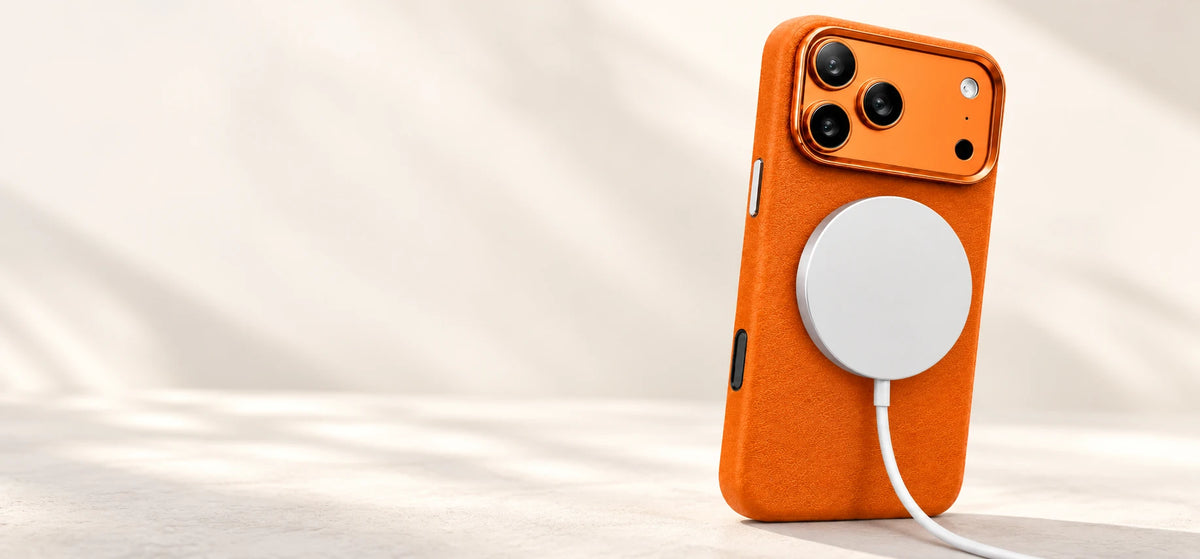 White magnetic puck attached to an orange vegan leather case.