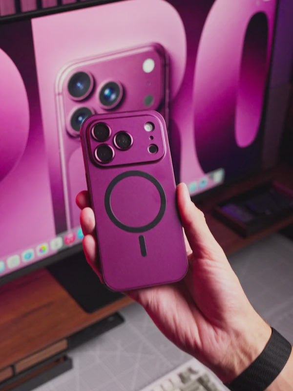 Dark cherry aluminum phone case shown from several angles under pink studio lighting