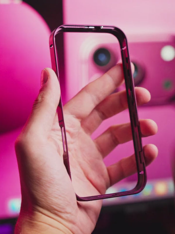 Phone placed into a dark cherry metal case followed by close-ups of the fitted frame and latch