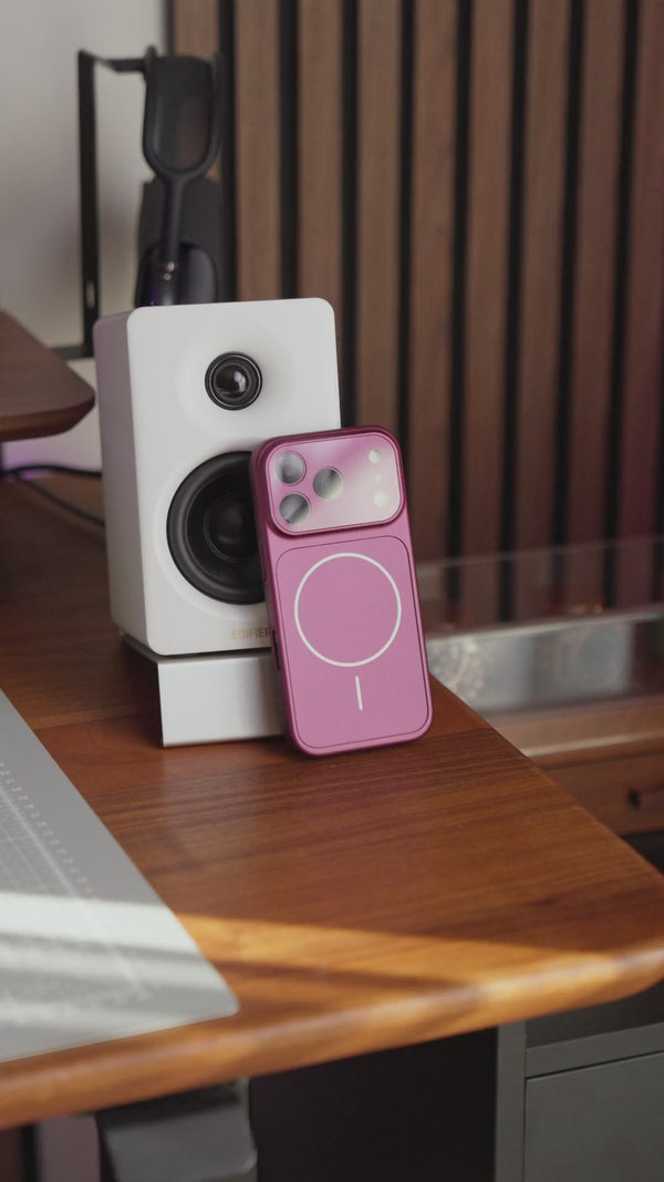 Burgundy matte case standing and held in hand