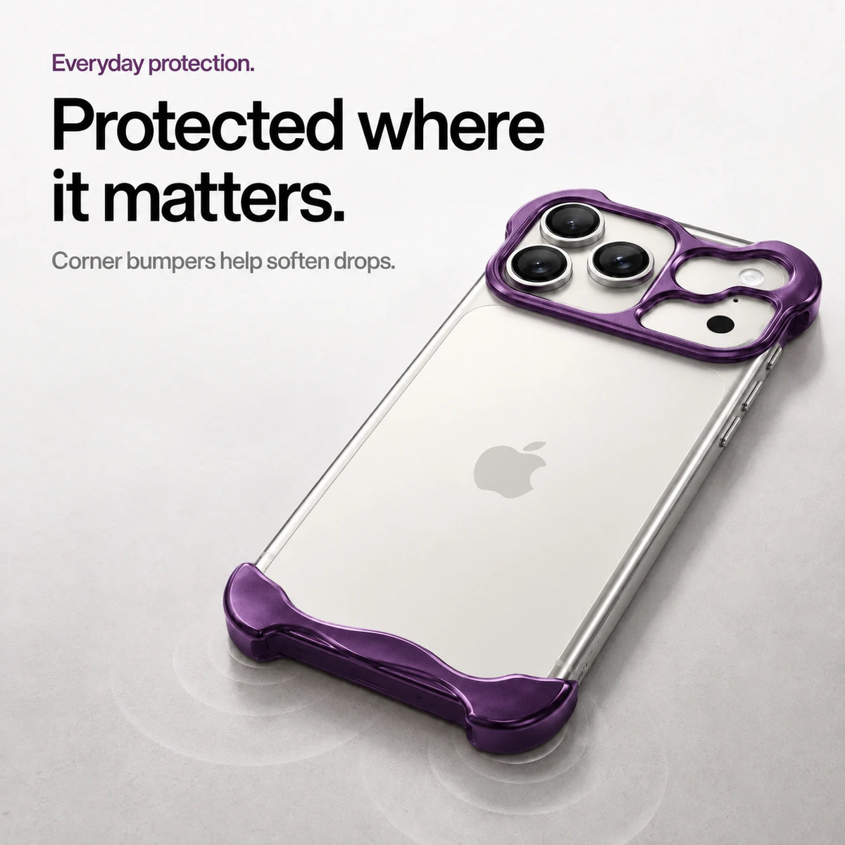 Violet sculpted metal phone case on a desk showing its protective corner bumpers #color_Lavender Purple